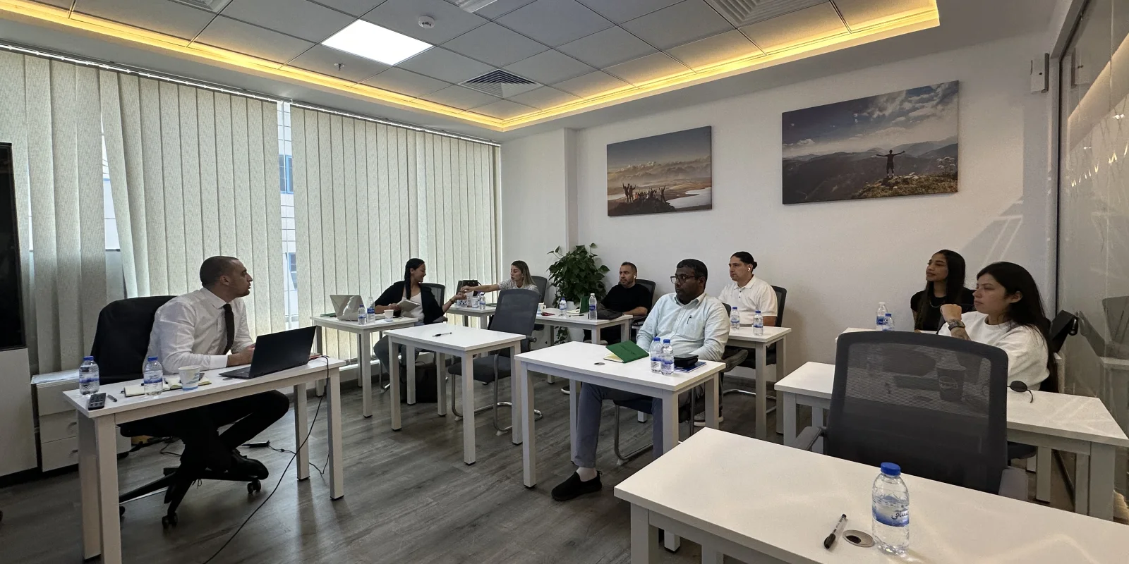 Certified PRO Program students in a live classroom session at the Sarmat training room in Dubai
